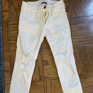 American Eagle super super stretch white ripped jeans